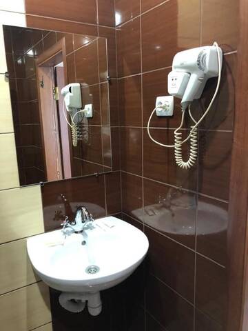 Фото номера Стандартный двухместный номер с 2 отдельными кроватями Отель Kontinent Hotel г. Мукачево 20