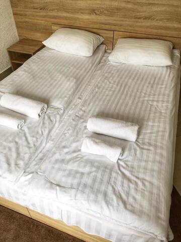 Фото номера Стандартный трехместный номер Отель Kontinent Hotel г. Мукачево 9