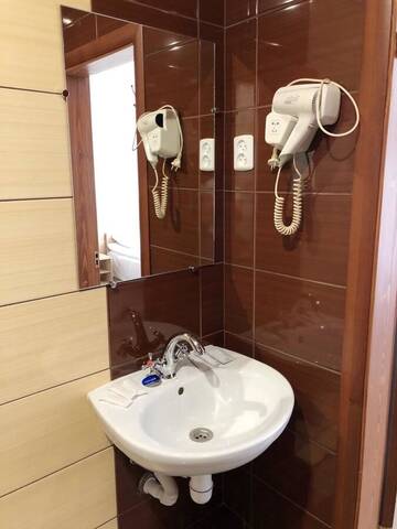 Фото номера Стандартный трехместный номер Отель Kontinent Hotel г. Мукачево 5