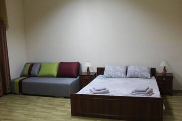Фото номера Четырехместный номер Апартаменты Apartments Domovik ,Kirilla i Mefodiya, 5 г. Мукачево 5