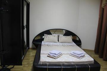 Фото номера Двухместный номер с 1 кроватью Апартаменты Apartments Domovik ,Kirilla i Mefodiya, 5 г. Мукачево 12