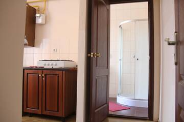 Фото номера Двухместный номер с 1 кроватью Апартаменты Apartments Domovik ,Kirilla i Mefodiya, 5 г. Мукачево 13