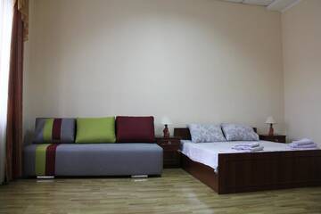 Фото номера Четырехместный номер Апартаменты Apartments Domovik ,Kirilla i Mefodiya, 5 г. Мукачево 15