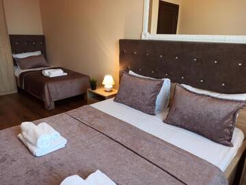 Фото номера Трехместный номер с балконом Апартаменты Elite Lux Apartment with balcony г. Мукачево 8